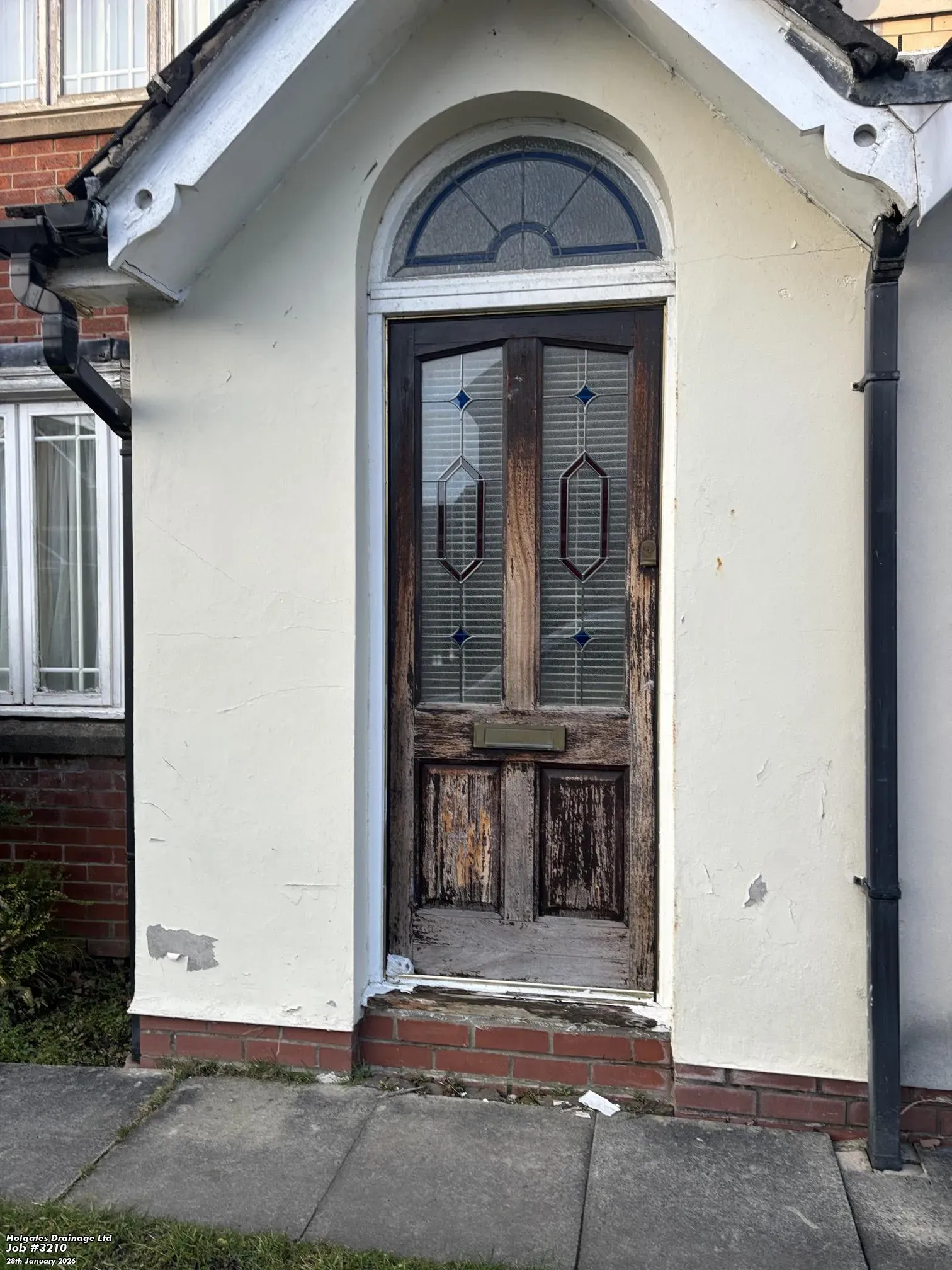 Exterior of a residential property in Blackburn Lancashire showing a front door and porch area