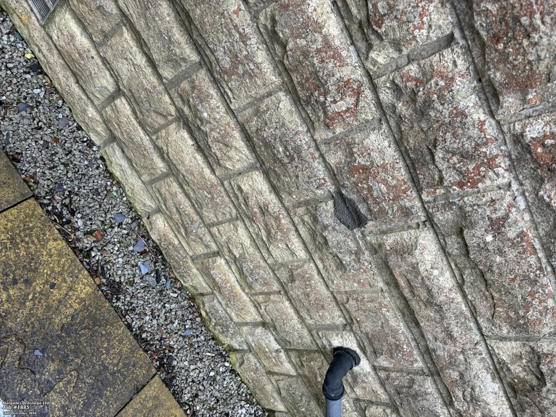 Professional rodent proofing and entry point sealing on a stone wall