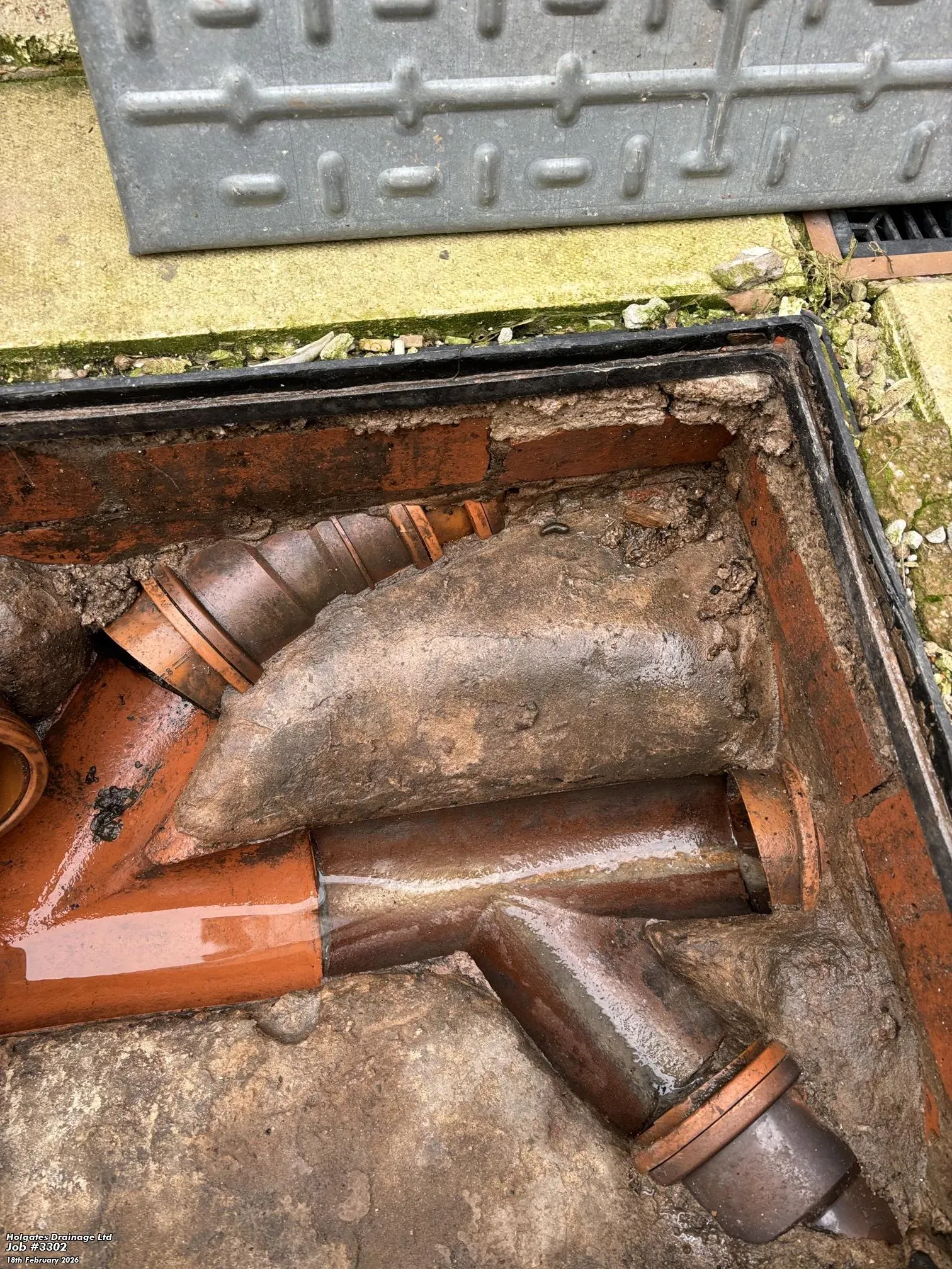 External drainage inspection chamber with clay pipes being surveyed for pest control entry points in Blackburn.