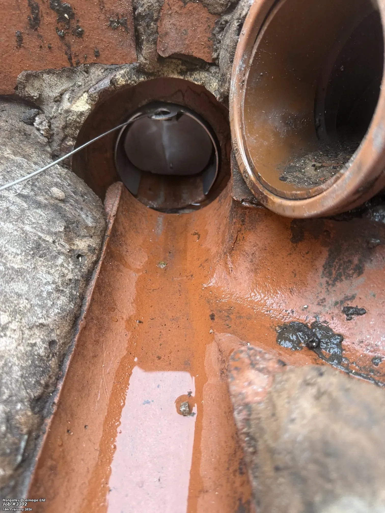 A rat flap installed in a drainage pipe for rodent proofing in Blackburn